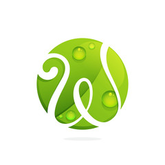 W letter with green leaves and dew drops.