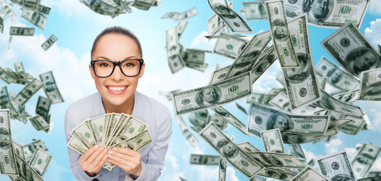 smiling businesswoman with dollar cash money