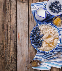 Oatmeal with blueberries and honey. Healthy Breakfast.Copy space.selective focus