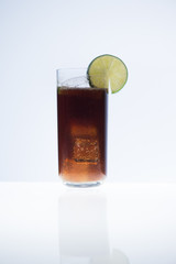 Cuba libre and dry ice smoke/close-up with white background