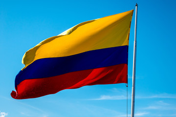 Colombia flag on a pole