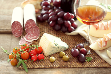 Still life with various types of Italian food and wine