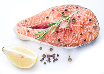 Salmon steak on white background.