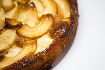 Apple pie on a white plate