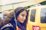 indian girl in New york in a rainy day. urban concept about New york city and lifestyle