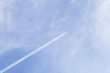 Plane flying high in the sky above  earth.