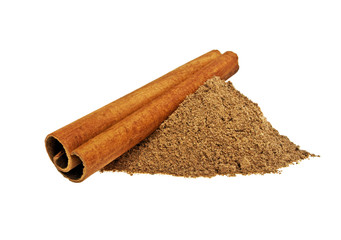 Cinnamon stick and powder on white background