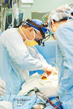 surgeons team at operation
