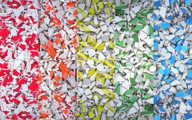 Colage formed by ceramic tiles broken pieces of rainbow colors.