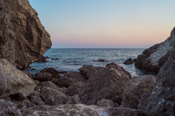 Sea and rocks at sunset