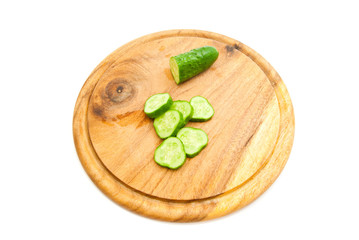 fresh cucumber on cutting board
