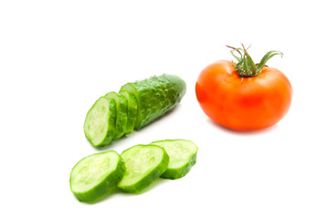 fresh cucumber and tomato on white