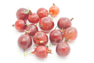 many red gooseberries on white