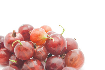 heap of gooseberries on white