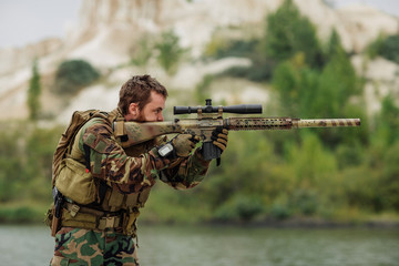 rangers to aim and shoot at a target with automatic weapons