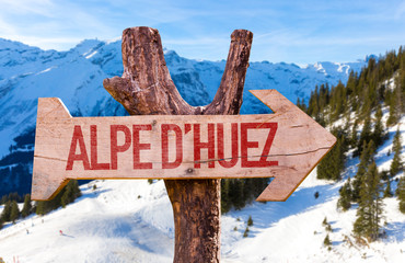 Alpe D'Huez wooden sign with winter background