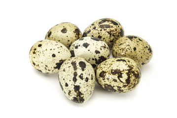 quail eggs on white