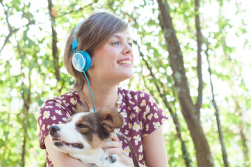 Obraz premium blonde girl with his dog