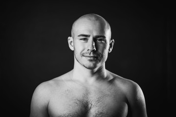 Fototapeta premium portrait bald man with a naked torso