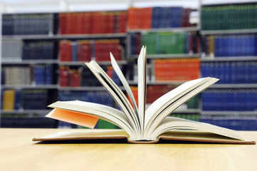 open book on library table