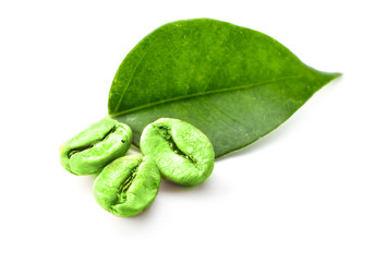 Green coffee beans with leaf isolated on white