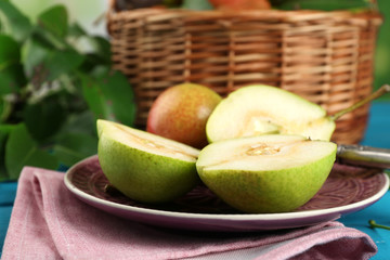 Fresh pears on wooden table, closeup