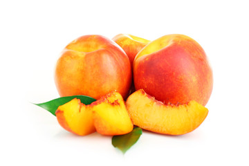 Fresh peaches isolated on white