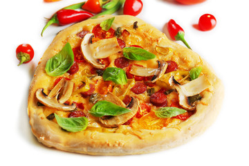 Heart shaped pizza and fresh vegetables isolated on white