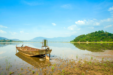 The passenger boat anchoring on lake, Dak Lak province, Vietnam.