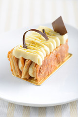 Stock Photo:
Piece of cake napoleon on white plate