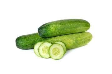 whole and sliced fresh cucumber on white background