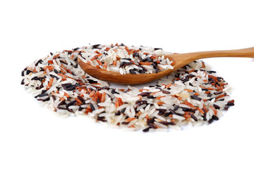 red and white organic rice on wooden spoon and on white backgrou