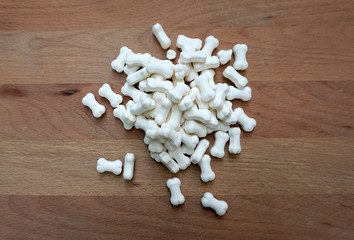 Fototapeta na wymiar Milk pellets in bone shape