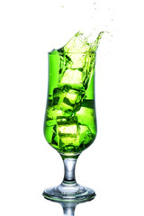 Green alcohol cocktail with splash isolated on white