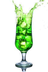 Green alcohol cocktail with splash isolated on white
