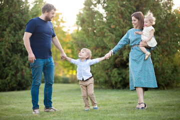 Cheerful family in park