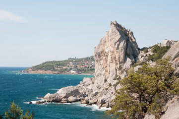 Fototapeta na wymiar View of Swan Wing rock, Simeiz village shoreline, Crimea