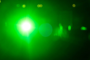 Green ray lights bokeh glitter defocused  abstract background