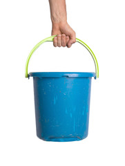 Human hand holding empty plastic pail
