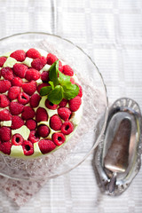 Pistachio mousse cake, cheesecake with raspberry