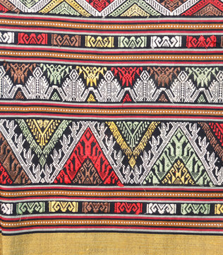 Colorful Thailand style rug surface close up vintage fabric is made of hand-woven cotton fabric