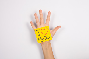 yellow note with "I love my job" words
