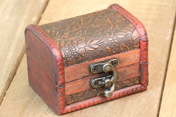 Treasure chest standing on wooden table