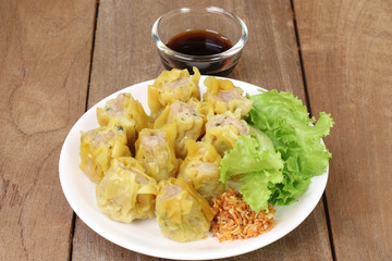Dumpling on the wooden floor.