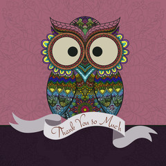 Ornamental owl on the patterned background.