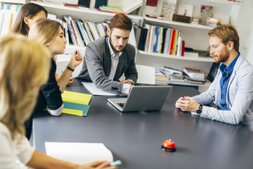 Group of designers discussing trends