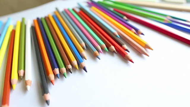 close-up colored pencils, dolly shot