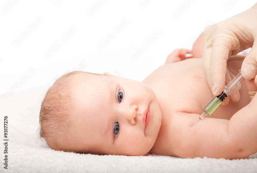 Wall mural doctor vaccinating calm baby