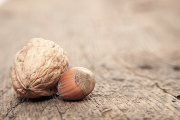 Various nuts on wooden board