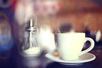 cup of tea at a cafe blurred background